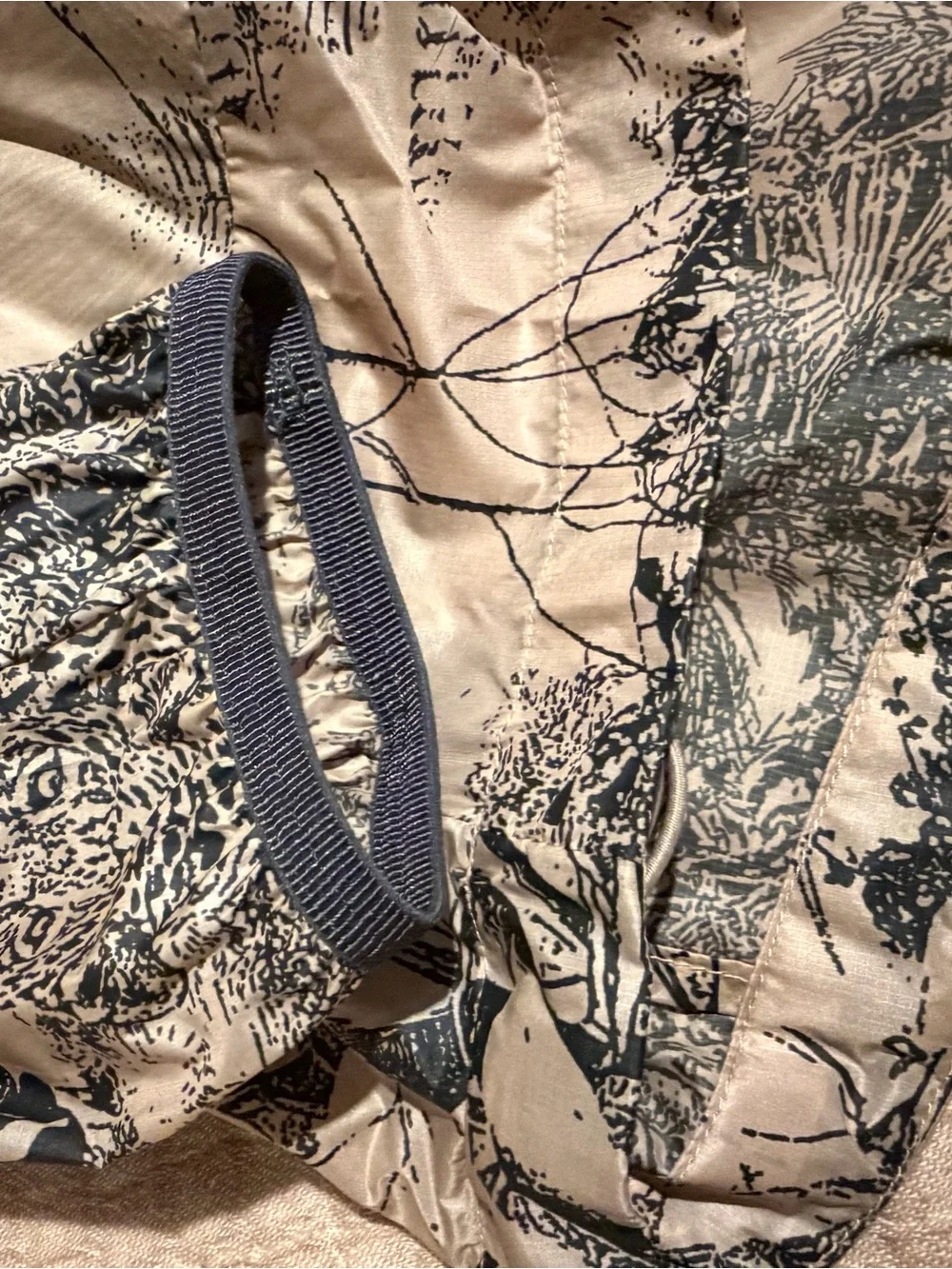 Nike ACG Hooded Jacket in Desert Tan and Black Nature Print